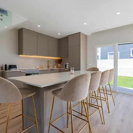 Poolside Oasis By Caparica Nyaraló Charneca