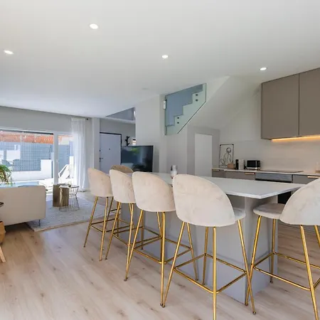 Poolside Oasis By Caparica Nyaraló