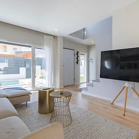 Poolside Oasis By Caparica Nyaraló Charneca