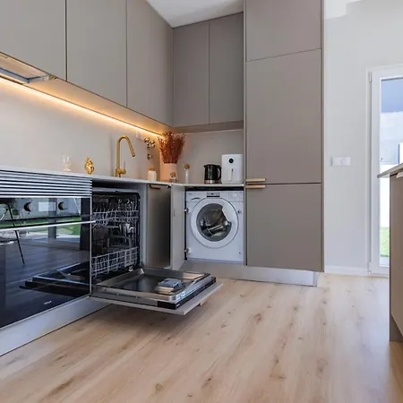 Poolside Oasis By Caparica Nyaraló Charneca