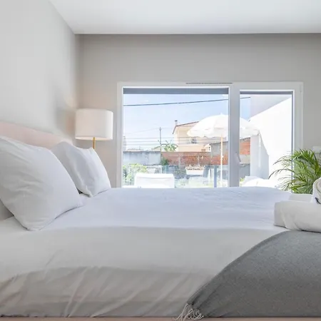 Poolside Oasis By Caparica Nyaraló Charneca